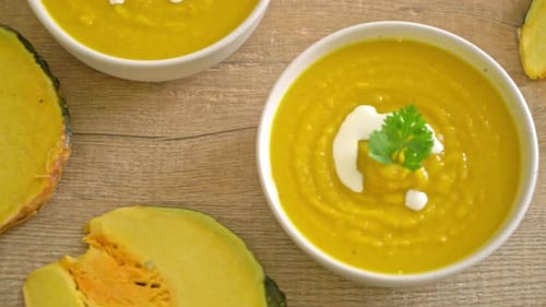 Creamy Pumpkin Soup with Fresh Herbs and Vegetables
