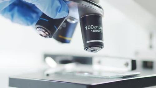 Closeup of Scientific Microscope Laboratory in Hospital Epidemic Disease Healthcare Vaccine Research