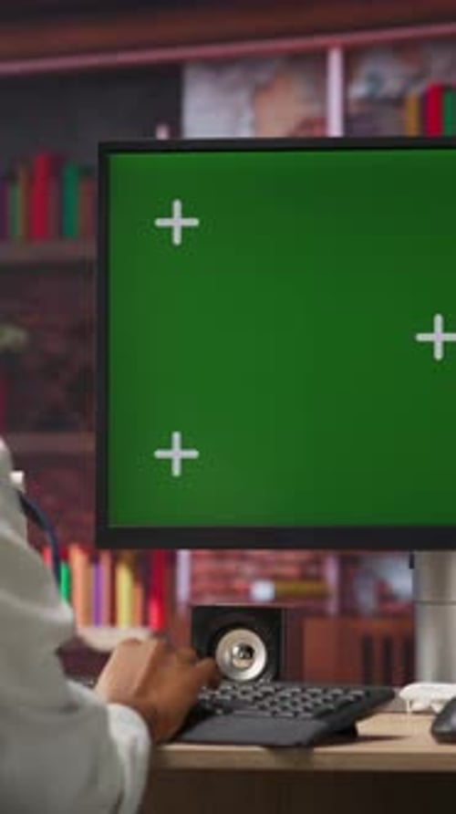 Vertical Video Student at Home Browsing Internet on Green Screen Computer
