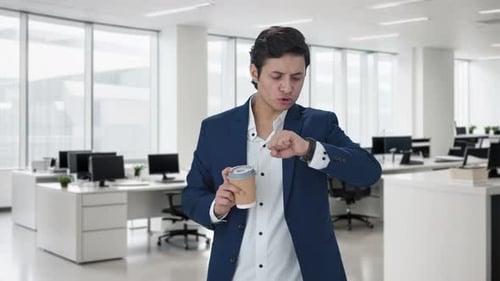 Anxious Indian manager waiting for someone