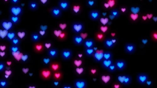 Romantic Bright Love Shape Falling Animation On Black Background. Glowing Heart Shape Flying On The