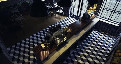 Modern Cafe Interior with Stylish Design and Coffee Preparation Activities