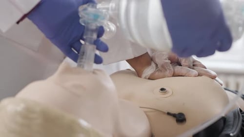 CPR on Medical Dummy with Hands and BVM
