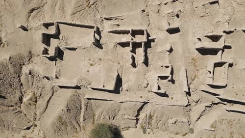 Historical walls of old houses. Archaeological sites in the desert. Proof of the existence of civili