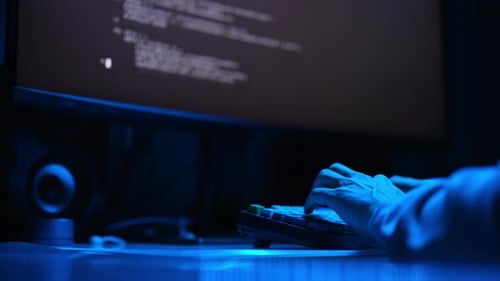 Closeup Cropped Shot Hands Typing on Computer Keyboard Working Online at Home Office with Neon