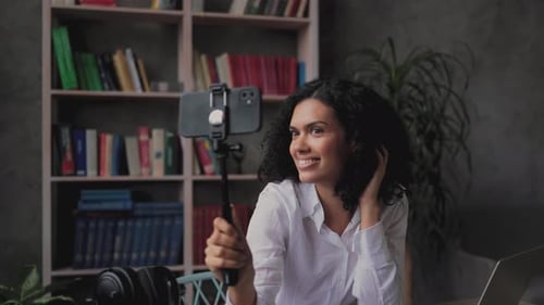 Smiling Woman Poses for Selfie at Home