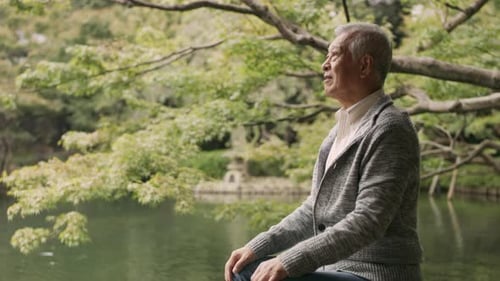 Elder in Japanese Garden Portrait