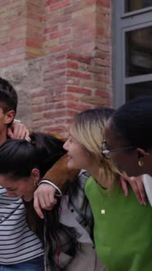 Laughing Young Adults Standing Together in the City