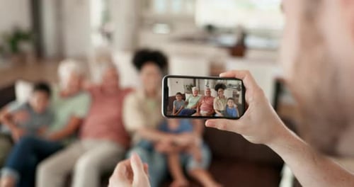 Family Capturing Memories with Smartphone Photo