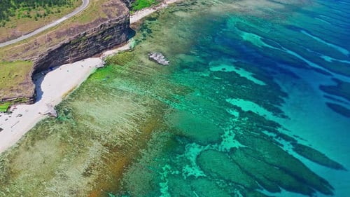 Aerial Orbit of Tropical Beach and Clear Blue Sea – Scenic Coastal Landscape