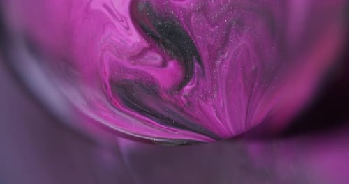 Swirling Pink and Black Glittery Paint Abstract
