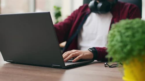 Tired Office Worker Finishes Work Takes a Break Closes Laptop Overworked Developer Ends Working Day