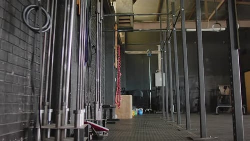 General view of multiple exercise devices at gym in slow motion