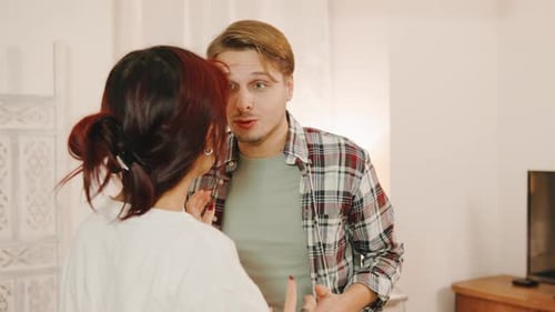 Woman Crying Being Comforted by Man