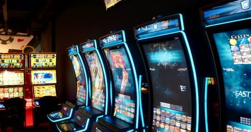 Batumi, Georgia - August 15 2023: Slider shot of modern casino slot machines