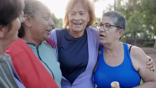 Happy senior people women after sport exercise workout having fun at park city