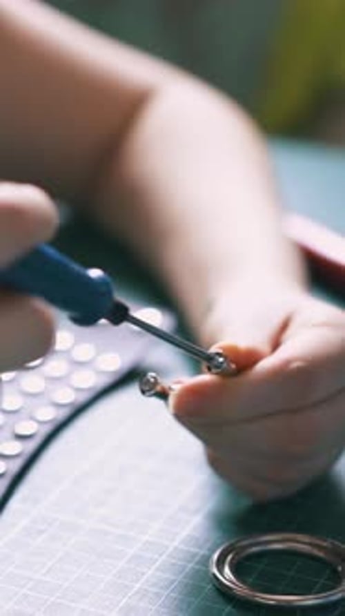 Child Assembling Electronic Project at a Desk