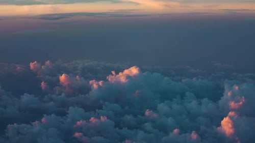 Aerial Cloudscape at Golden Hour with Sunlight