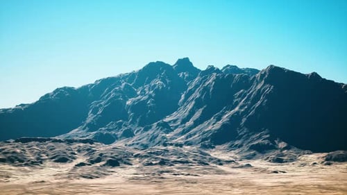 Sundrenched Mountain Range with Expansive Dry Plains and Clear Sky