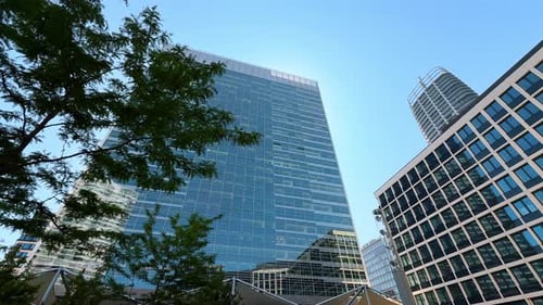 Exteriors of the modern buildings in the town or city. Low angle view at the architecture