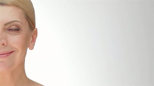 Smiling Woman with Blond Hair in Close Up