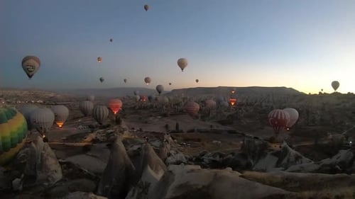 timelapse of hot air balloons rising over the Cappadocia, Turkey during sunrise