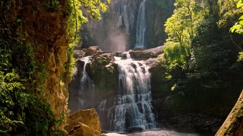 Spectacular Cinematic Aerial View of Secret Tropical Rainforest Waterfall Oasis