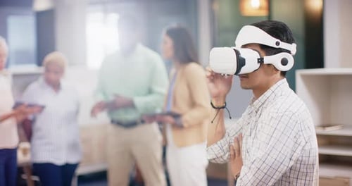 Man Using VR Headset in Modern Office
