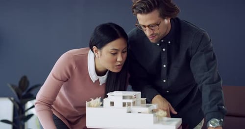 Business people, model and architecture office for design planning, development or project teamwork