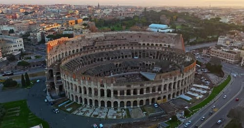 Aerial View of Iconic Ancient Arena of Colosseum at Sunset Flavian Amphitheatre in the Heart of Rome