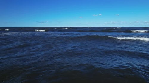 Beautiful Ocean Waves Under Blue Sky