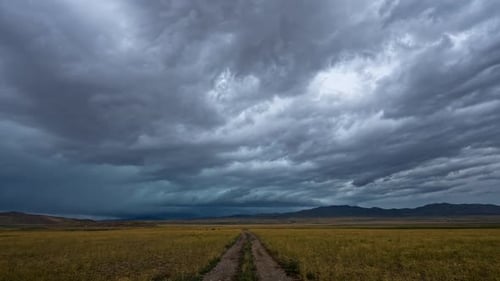 Timelapse of storm rolling over desert landscape in Northern Utah