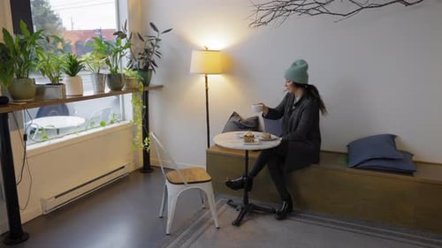 Woman in cafe drinking a coffee
Shot in 4k 60 with option to be slowed down.