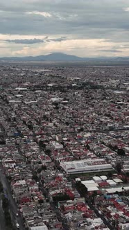 Overhead vertical shot of the sprawling urban landscape of Ecatepec