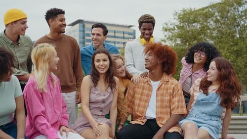 Diverse Young Adults Smiling Together Outdoors