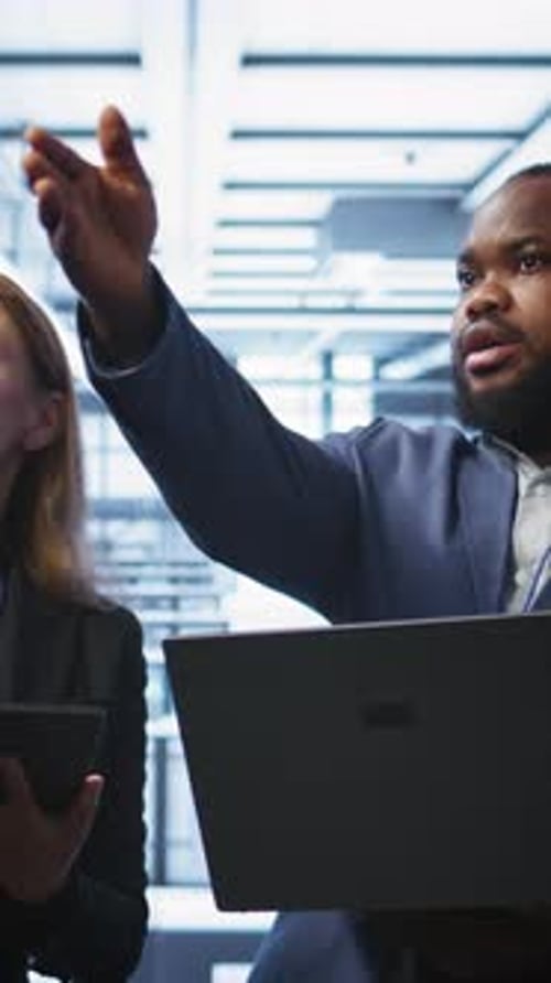 Vertical Video Colleagues Brainstorming in Server Hub Ensuring Optimal Performance