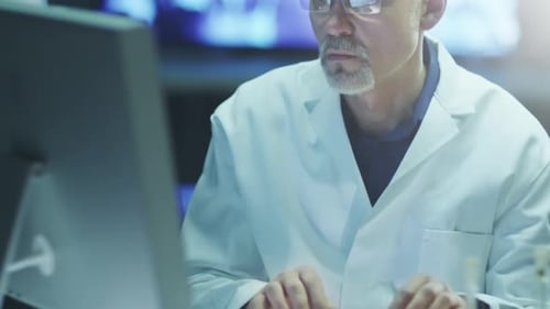 Scientist is Works on Computer in Laboratory, Jib shot.