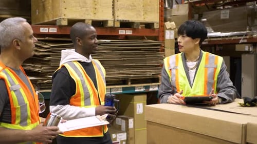 Warehouse Supervisor and Workers Talking in Meeting Africanamerican Ethnicity