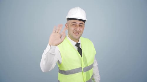 Engineer waving at camera.