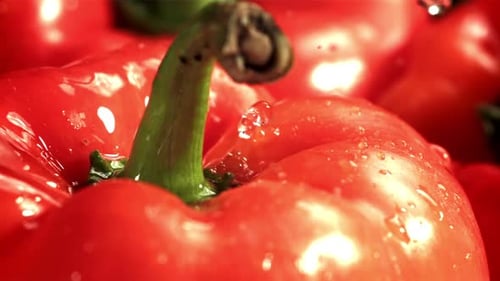 Close Up of Red Peppers Being Washed