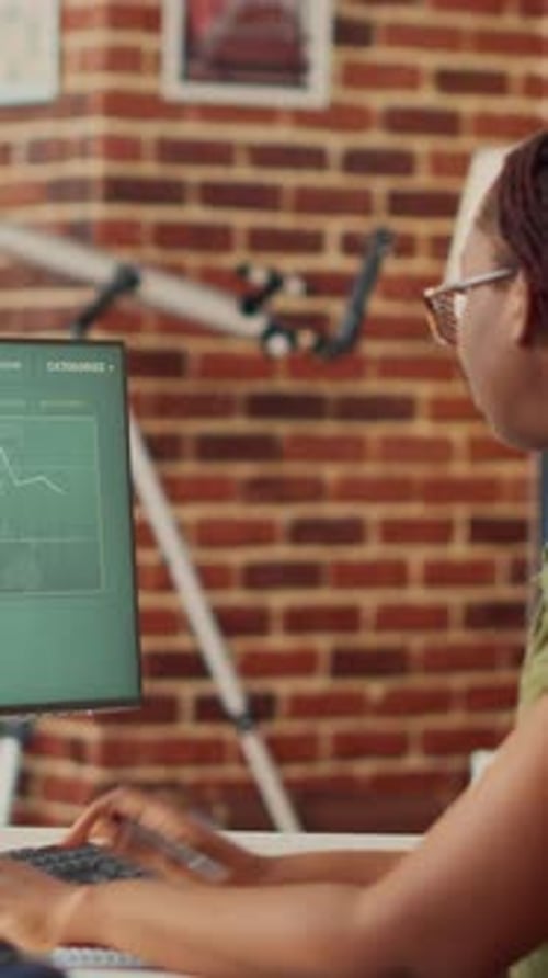 Vertical Video African American Woman Working Remote on Data Sales Report