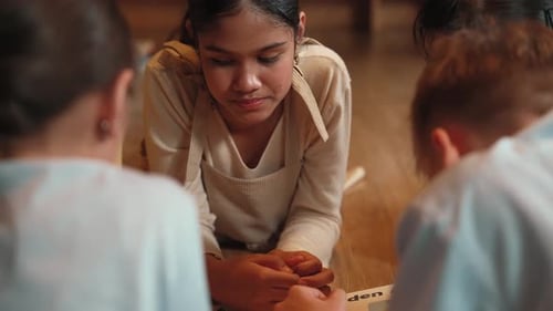 Caucasian girl sharing experience while reading a book with friend. Edification