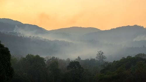 Misty Mountains at Sunrise