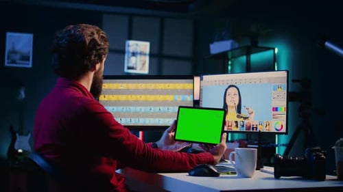 Photo Editor Following Tutorial on Green Screen Tablet Learning How to Build Digital Portfolio