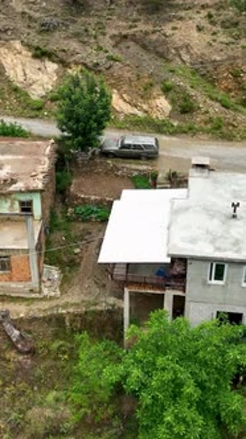 Vertical Video Mountain Village Rain Aerial Scenery in Vertical Format