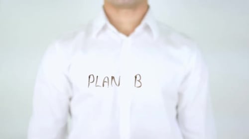 Man Writes Plan B on Clear Surface