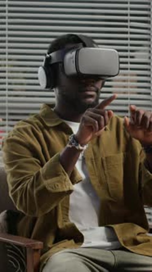 Zoomer in VR Goggles Developing App in Office