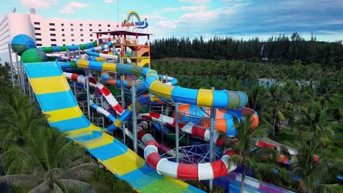 Aerial View of Tropical Resort with Adventure Waterpark Aquapark Water Slides and Pool Area Family