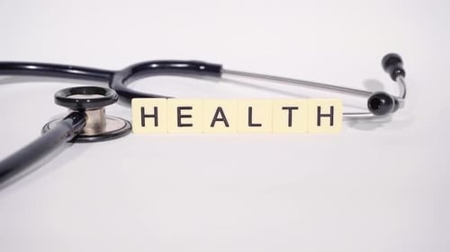 Health Message with Stethoscope on White Background