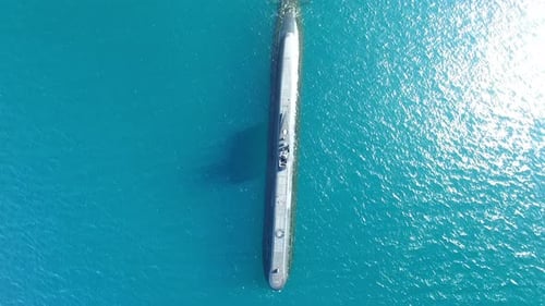4K aerial drone footage of a submarine on the ocean